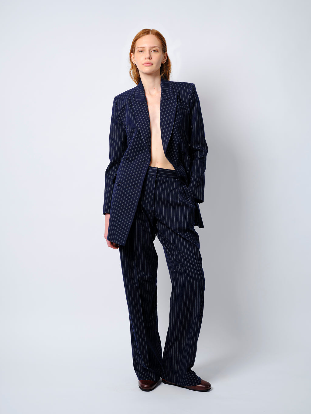 The Rune trousers in navy pinstripe