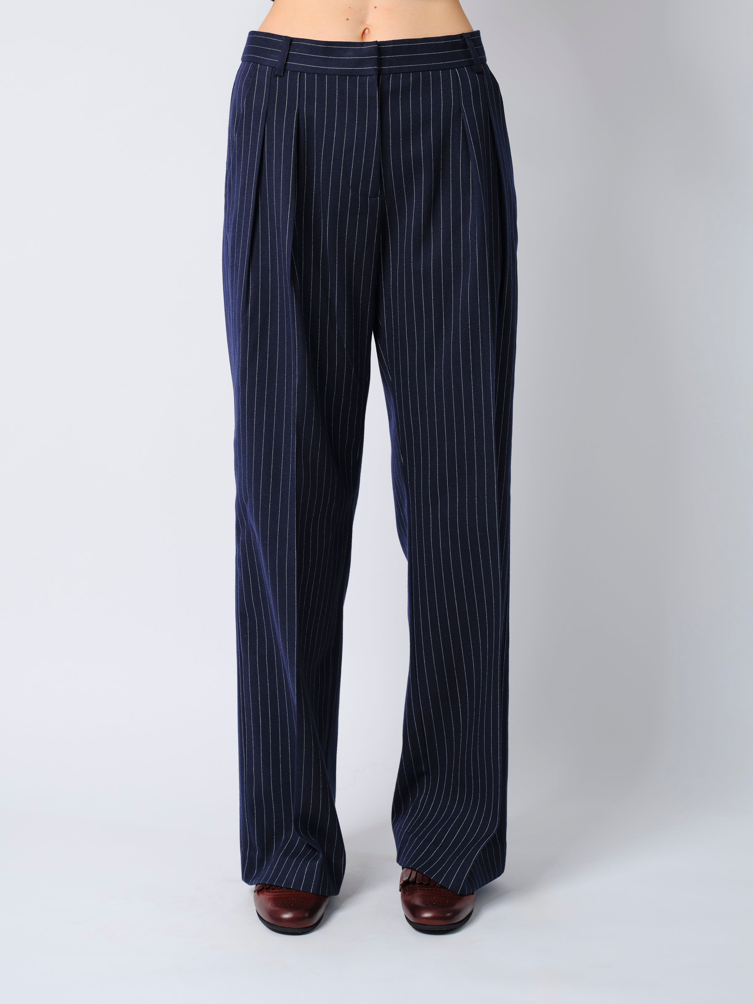 The Rune trousers in navy pinstripe