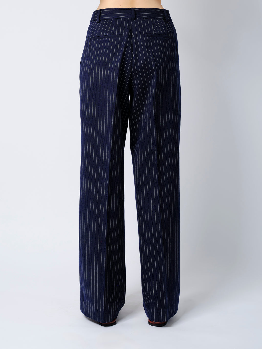 The Rune trousers in navy pinstripe