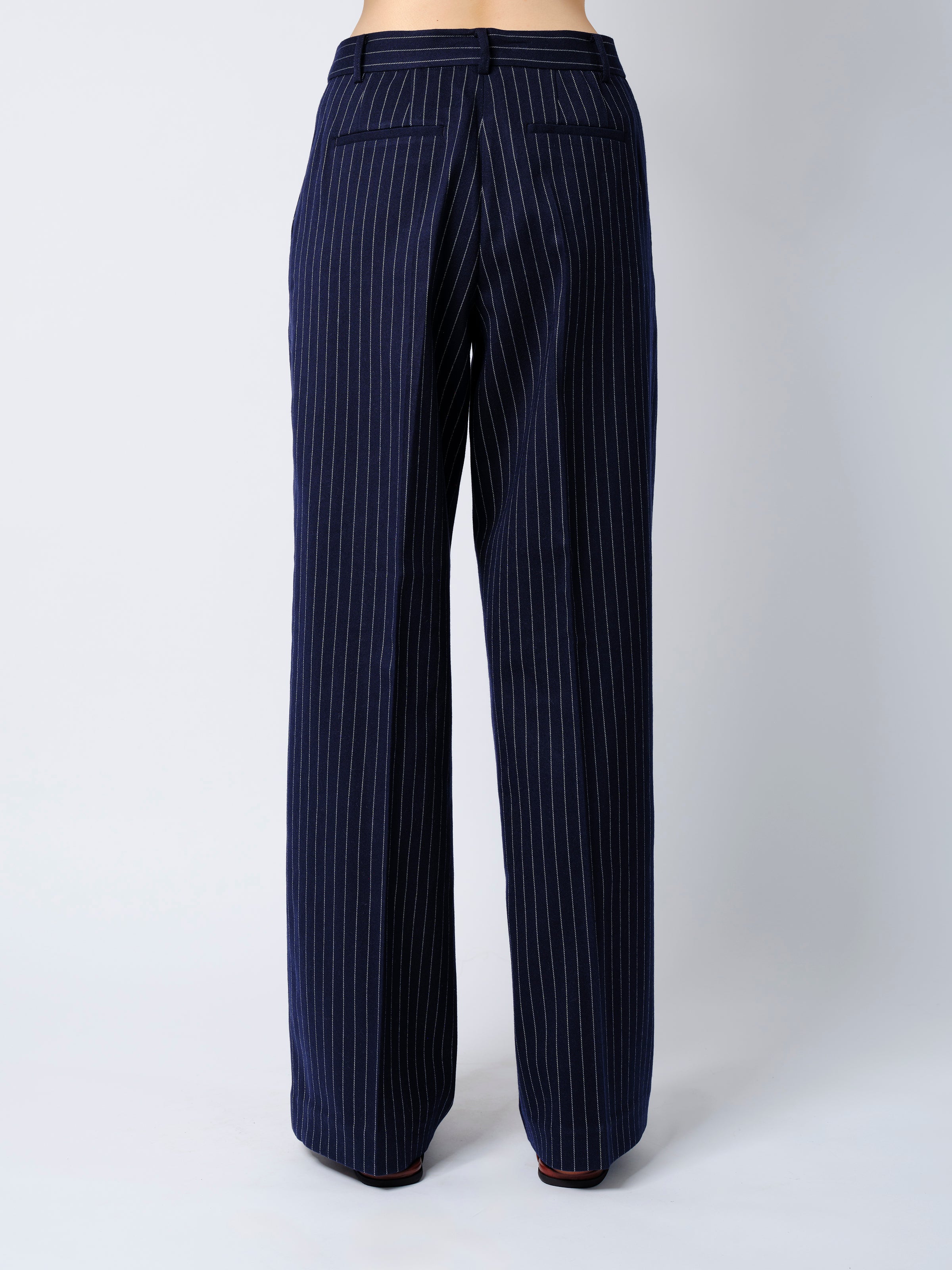 The Rune trousers in navy pinstripe