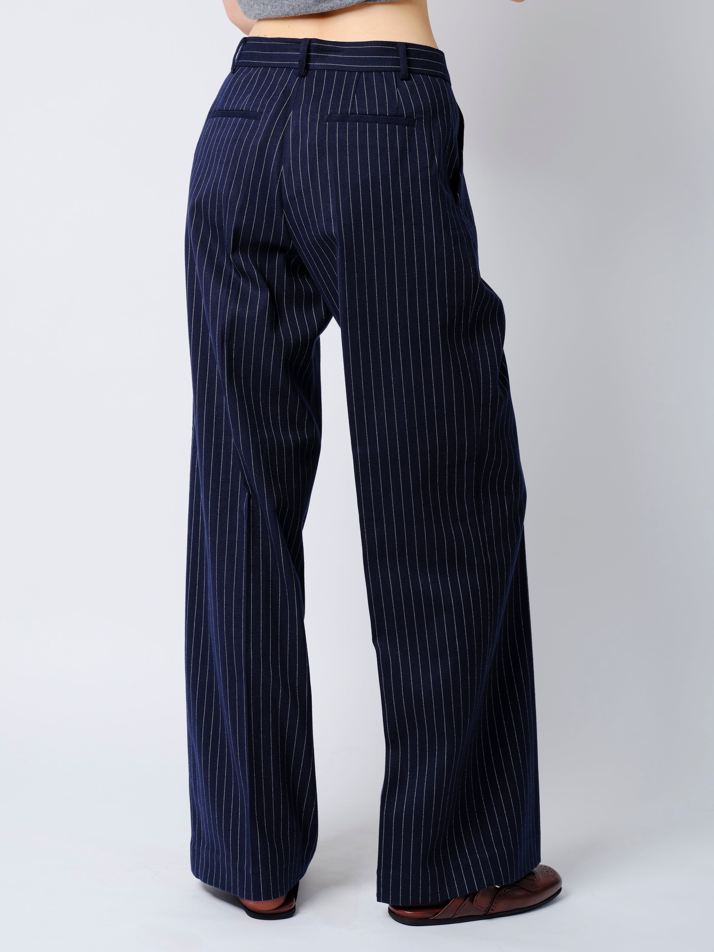 The Rune trousers in navy pinstripe