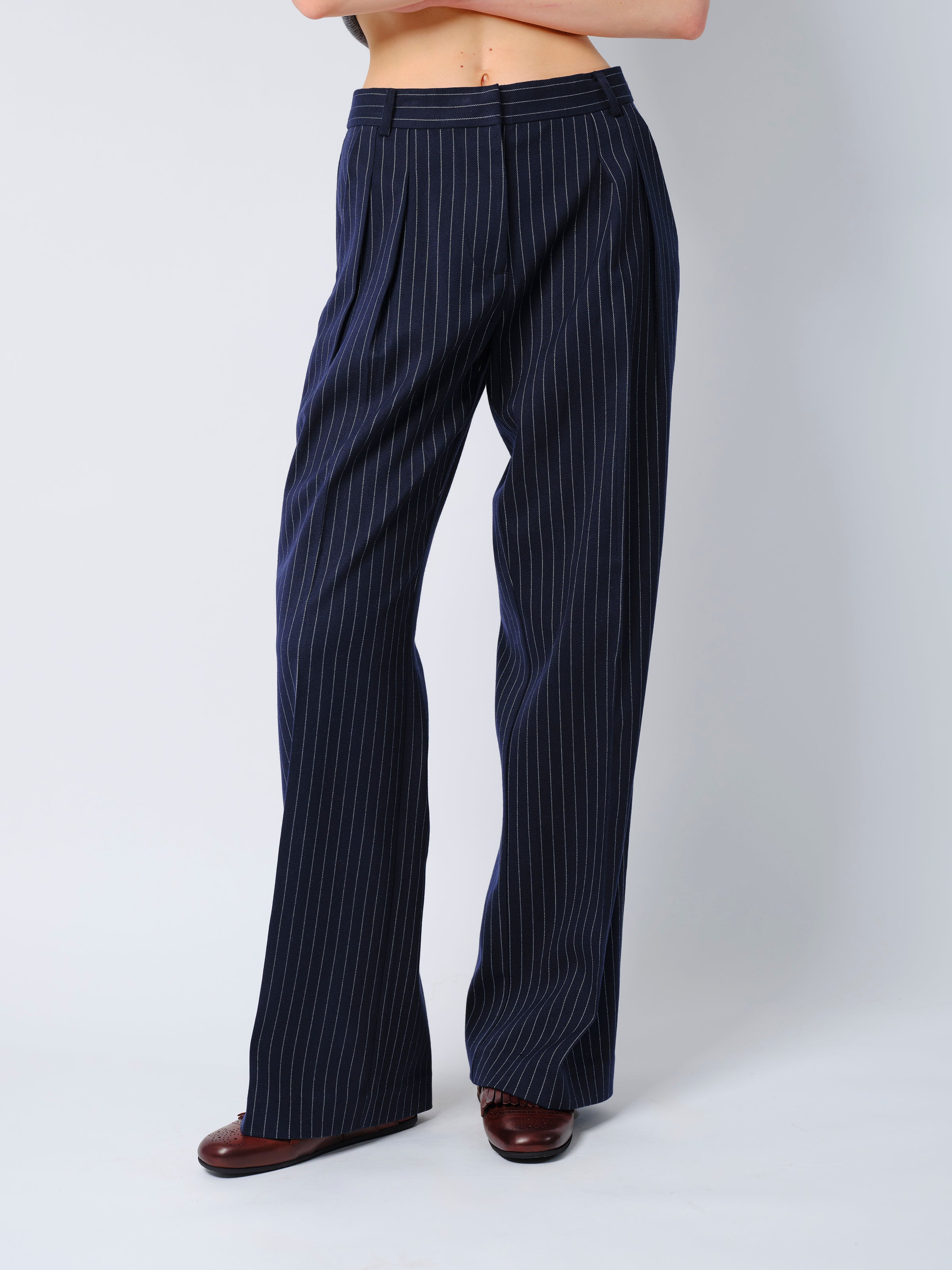 The Rune trousers in navy pinstripe