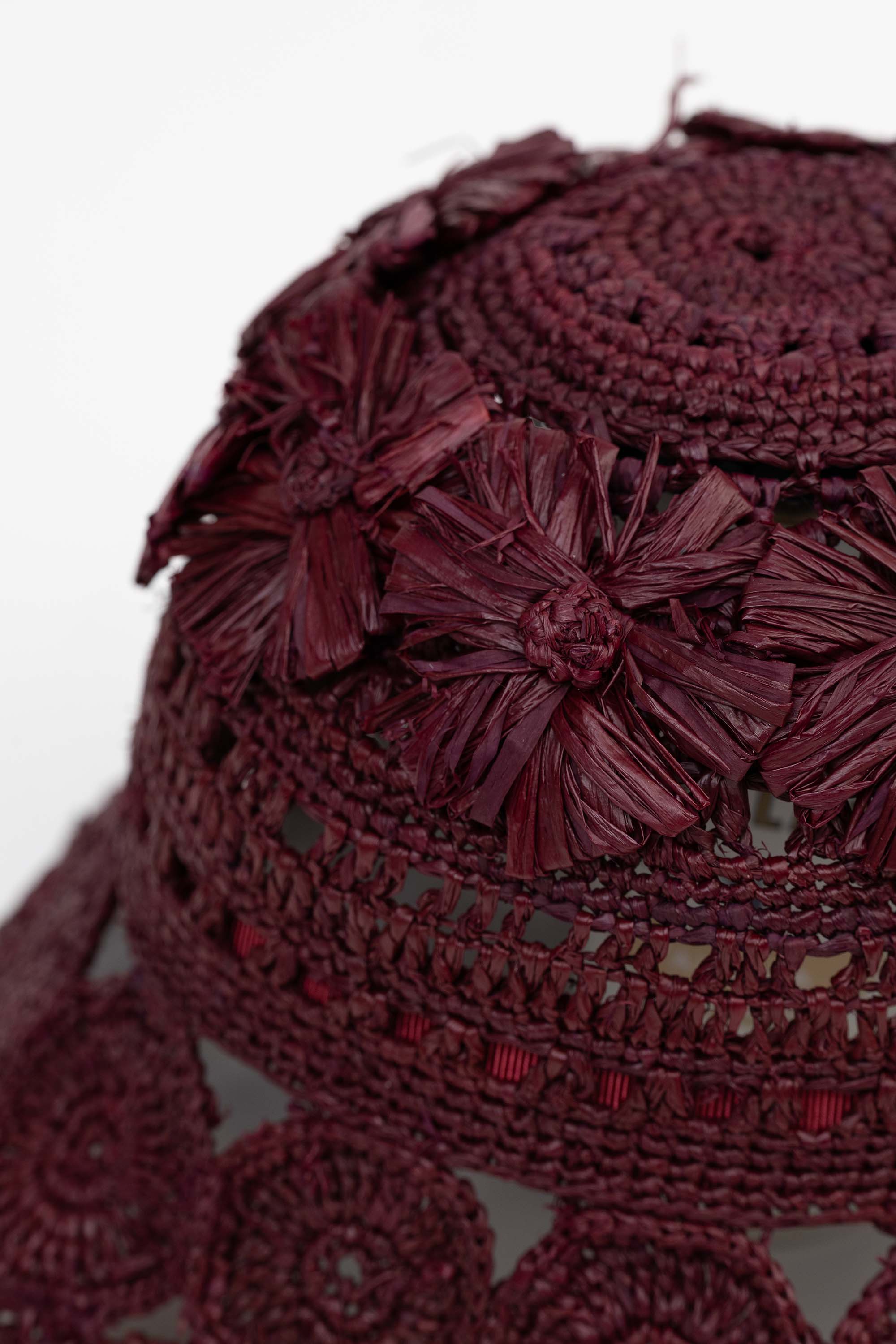 The Cass raffia bucket hat in wine