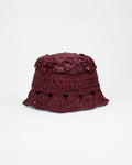 The Cass raffia bucket hat in wine