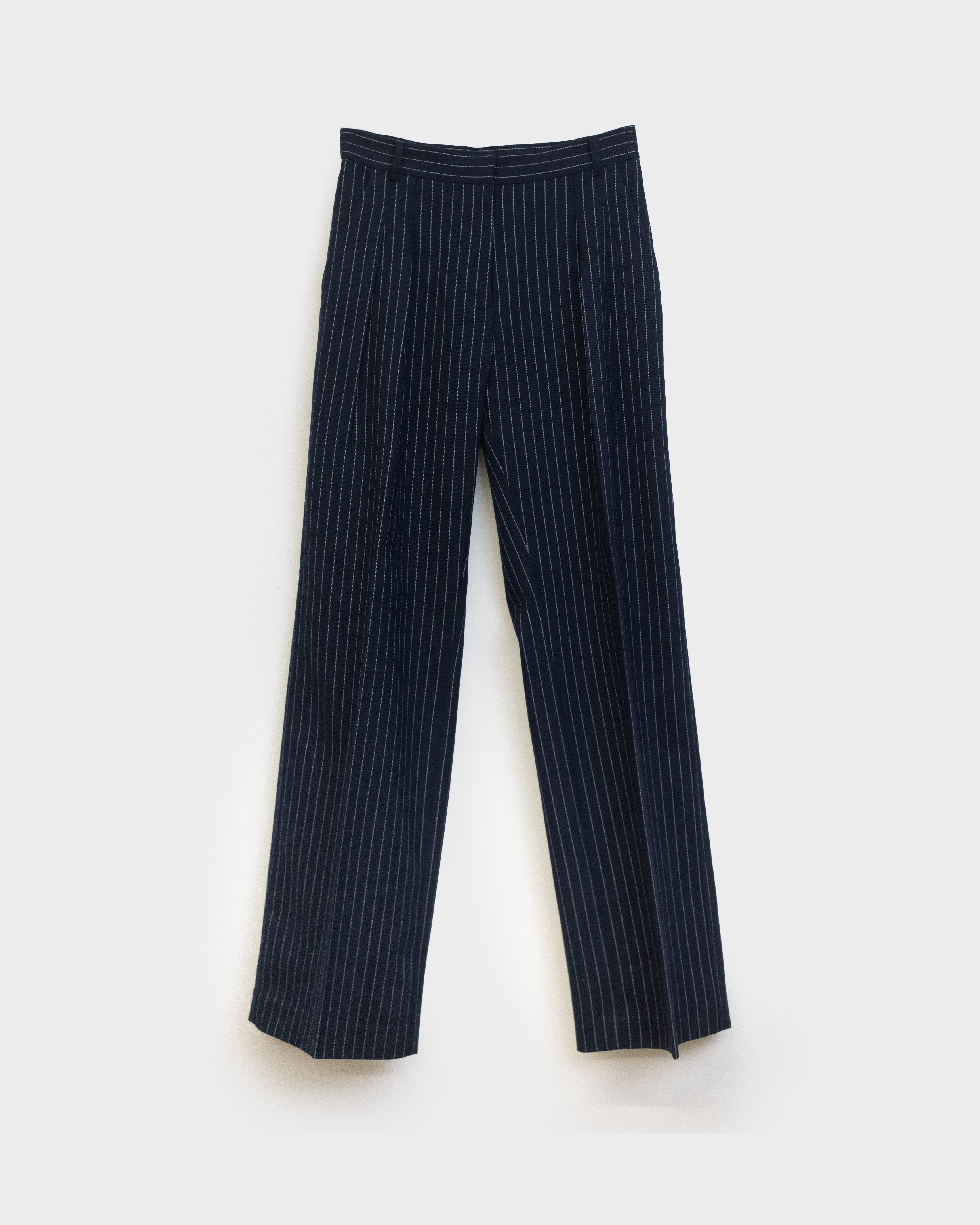 The Rune trousers in navy pinstripe